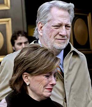 Former WorldCom chief Bernard Ebbers leaves Manhattan Federal Court with his wife, Kristie, after being convicted for his role in the biggest corporate bankruptcy filing in the U.S.