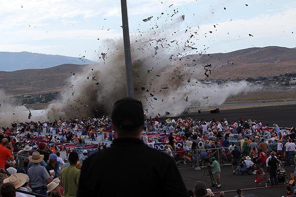 A P-51 Mustang airplane crashes into the edge of the grandstands at the Reno National Championship Air Races. The World War II-era fighter plane flown by a veteran Hollywood stunt pilot Jimmy Leeward plunged Friday into the edge of the grandstands during the popular air race, creating a horrific scene strewn with debris.