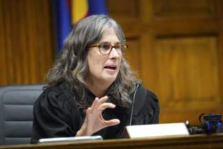 Judge Sarah B. Wallace presides over closing arguments in a hearing for a lawsuit to keep former President Donald Trump off the state ballot, Wednesday, Nov. 15, 2023, in Denver. (AP Photo/Jack Dempsey, Pool)