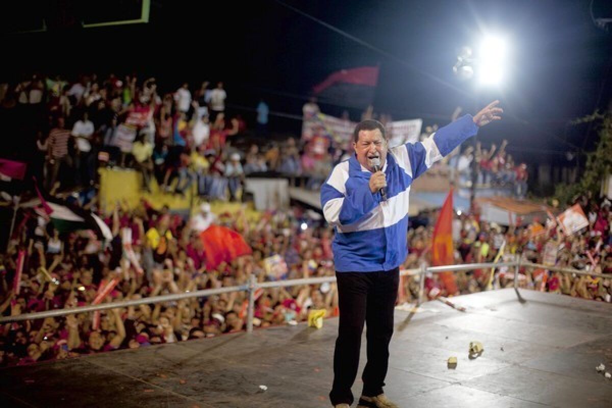 Venezuelan President Hugo Chavez addresses a campaign rally in Valencia. He is running against opposition candidate Henrique Capriles in Sunday's election.