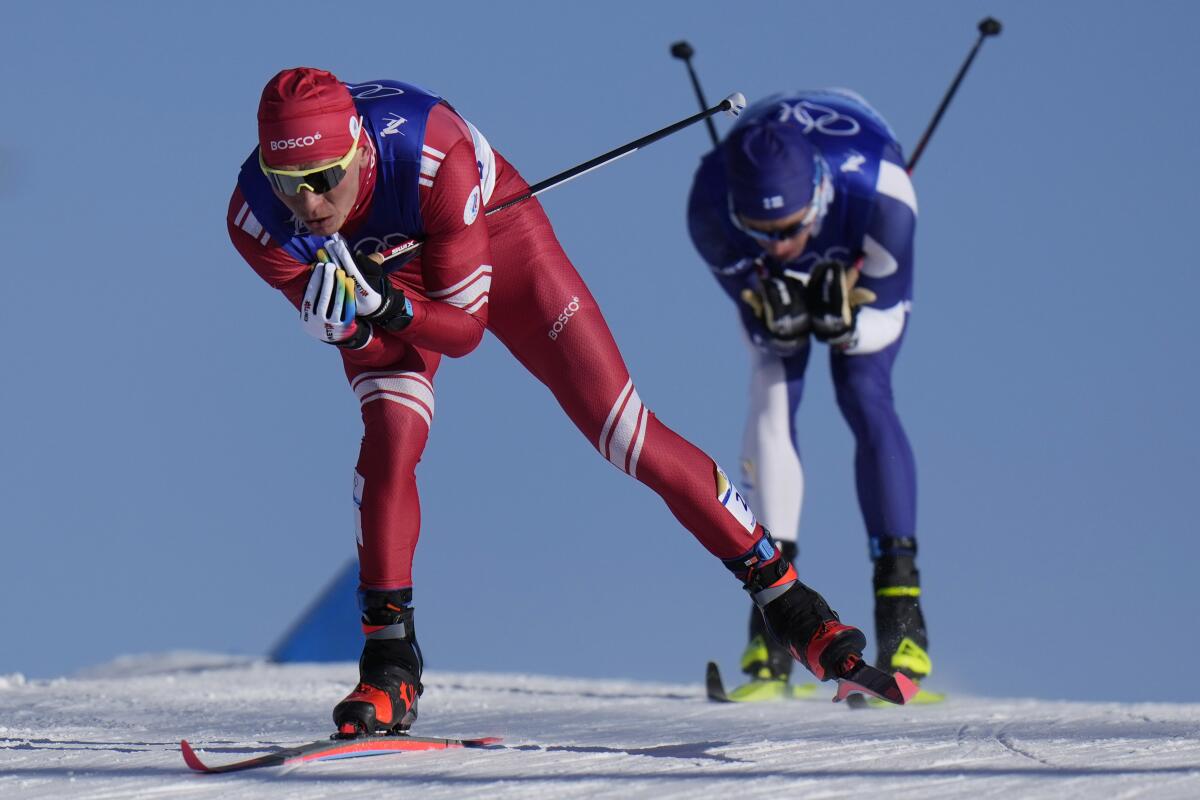 Russian athlete Alexander Bolshunov competes in the men's 30-kilometer skiathlon.