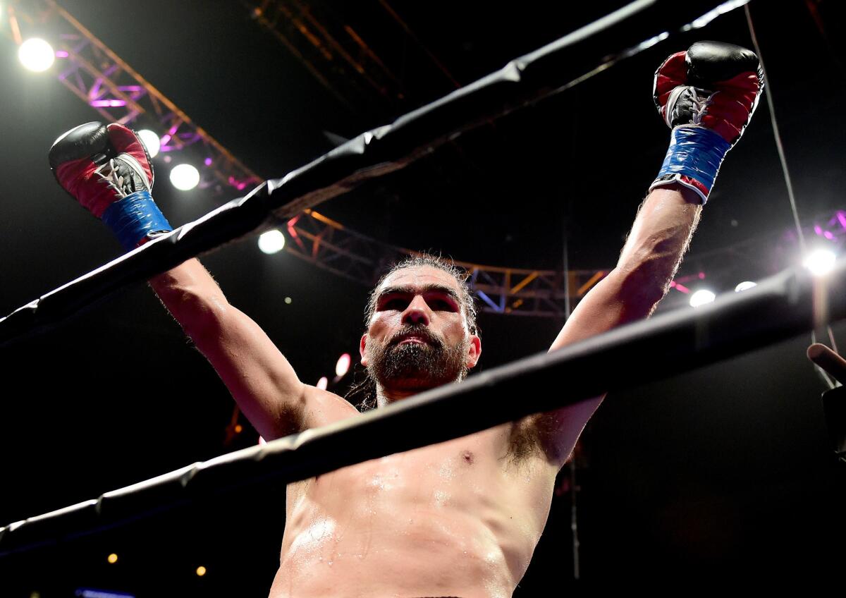 LOS ANGELES, CA - AUGUST 29: Alfredo Angulo of Mexico celebrates a fifth round TKO victory over Hector Munoz during the super middleweight bout at Staples Center on August 29, 2015 in Los Angeles, California. (Photo by Harry How/Getty Images) ** OUTS - ELSENT, FPG - OUTS * NM, PH, VA if sourced by CT, LA or MoD **