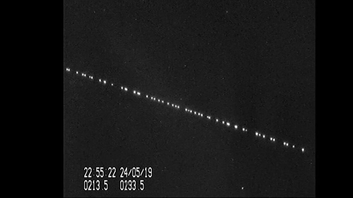 An image from video shows a parade of SpaceX Starlink satellites passing over Leiden, Netherlands on May 24, 2019.