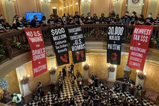 Hundreds of Jewish organizers calling for a ceasefire in Gaza assembled in the California Capitol in Sacramento on Wednesday, Jan. 3, 2024, interrupting the first week of the legislative session.(Mackenzie Mays/Los Angeles Times)
