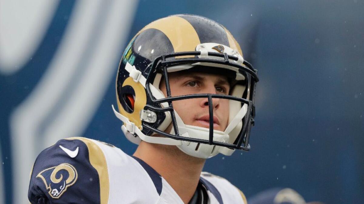 Rams rookie quarterback Jared Goff walks onto the field before a game against Miami on Nov. 20.