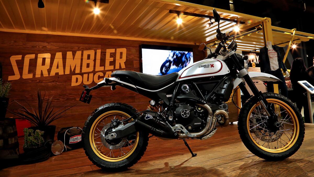 A group of industry veterans met prior to last year's Progressive International Motorcycle Show in Long Beach to discuss new sales strategies. The Ducati Scrambler, seen here at the 2016 show, was cited as an example of smart marketing.
