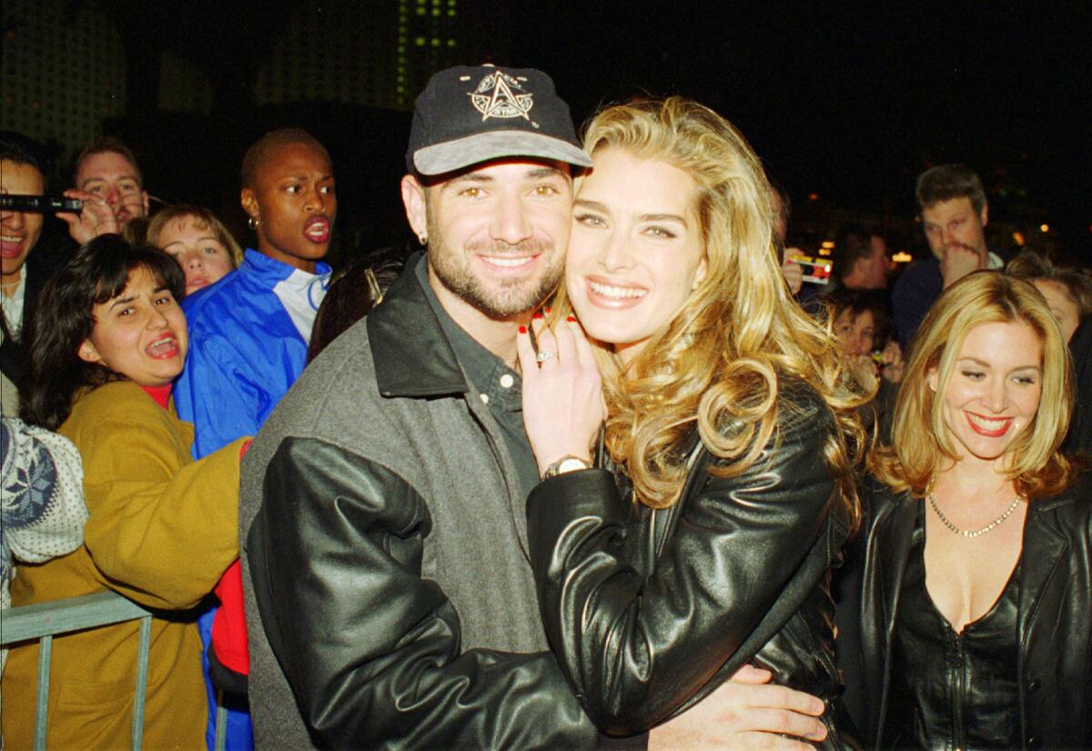 Andre Agassi and Brooke Shields arrive for the grand opening of the Official All Star Cafe in Las Vegas in 1996.