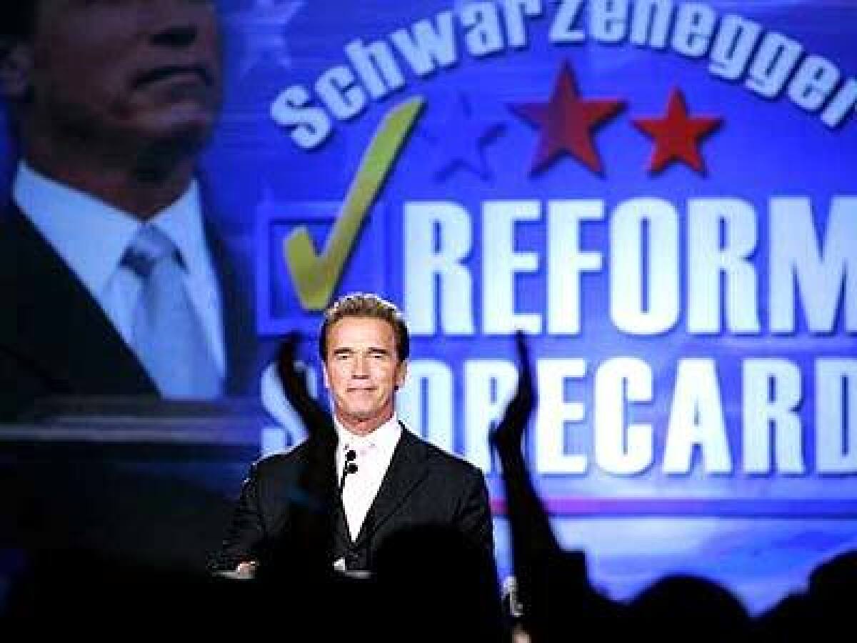 California Governor Arnold Schwarzenegger addresses a crowd at the Beverly Hilton Tuesday during election night, telling them the results on state propositions were a victory for the voters.