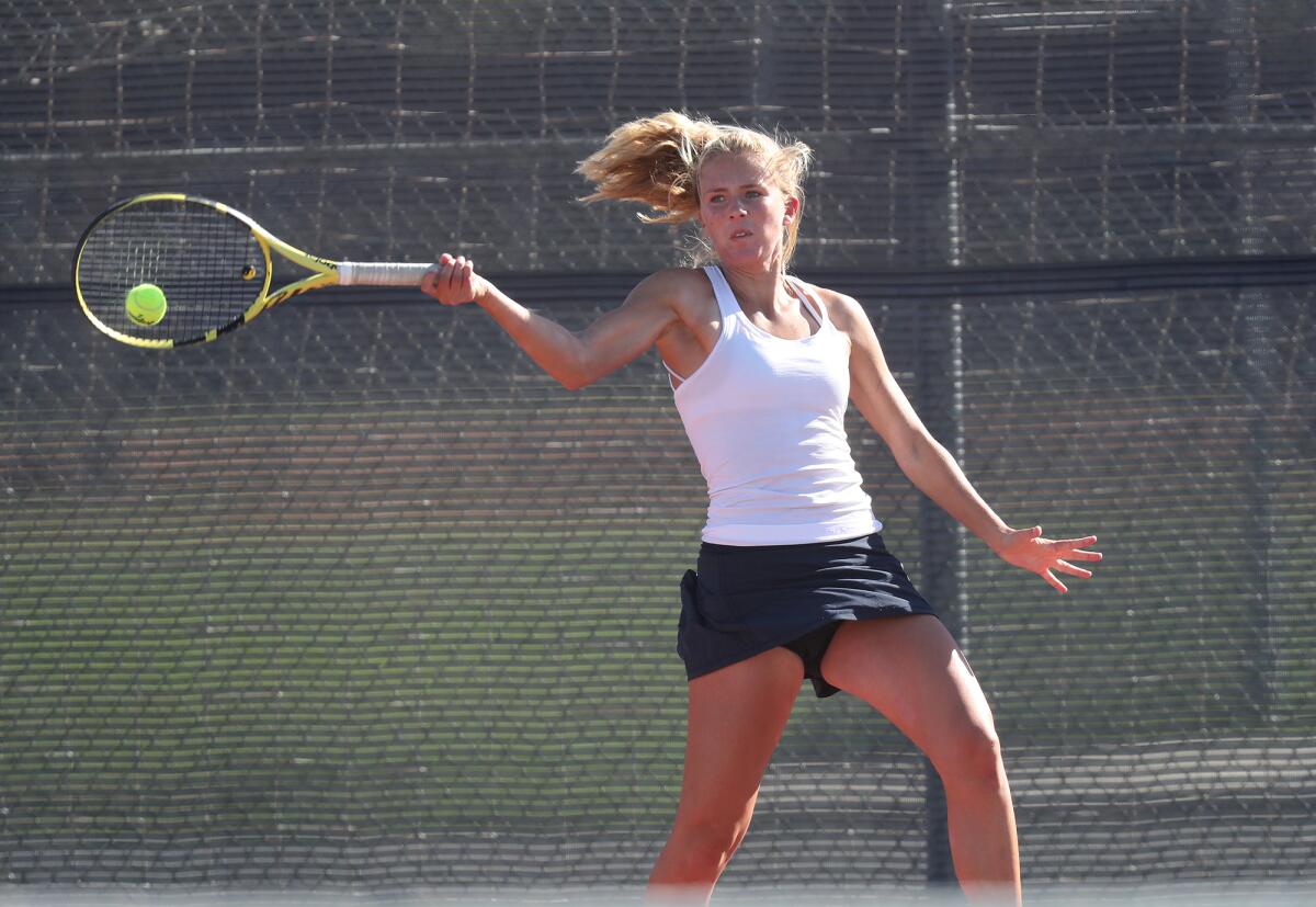 Corona del Mar's Jane Paulsen competes against Huntington Beach in a Surf League match on Tuesday. 