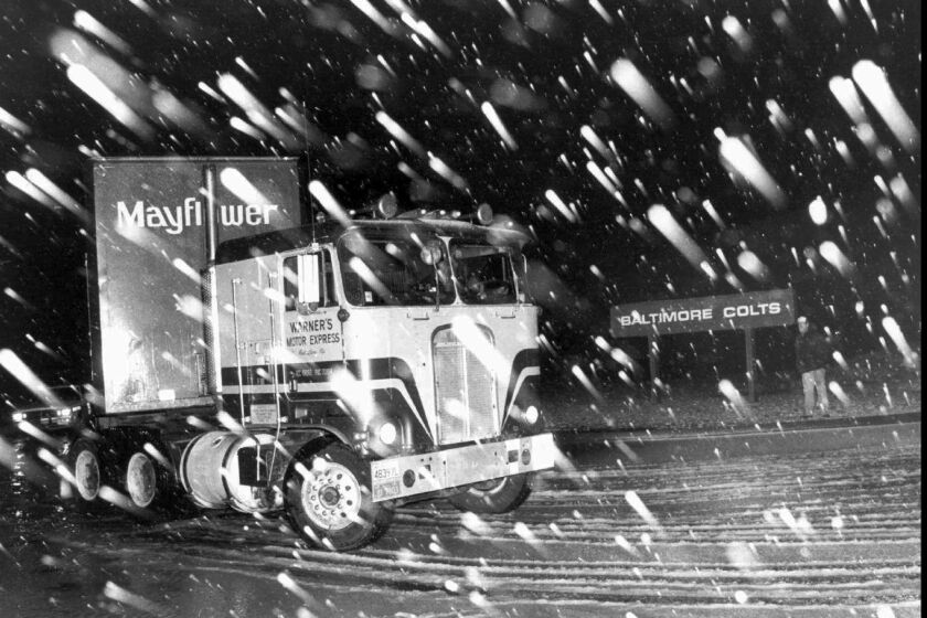 A moving van carrying the Baltimore Colts' equipment leaves Baltimore for Indianapolis in the middle of the night on March 19, 1984.