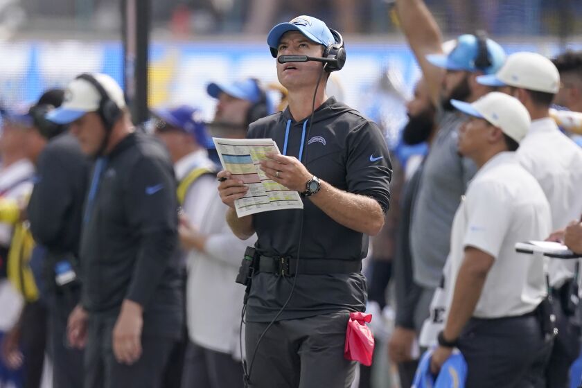 Los Angeles Chargers head coach Brandon Staley watches during the first half of his team's NFL football game against the Jacksonville Jaguars in Inglewood, Calif., Sunday, Sept. 25, 2022. (AP Photo/Mark J. Terrill)