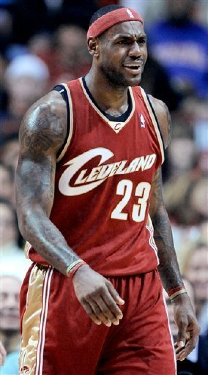 Cleveland Cavaliers' LeBron James' argues with a referee in the first quarter during a NBA basketball game in Chicago, Saturday, Nov. 8, 2008. (AP Photo/Paul Beaty)