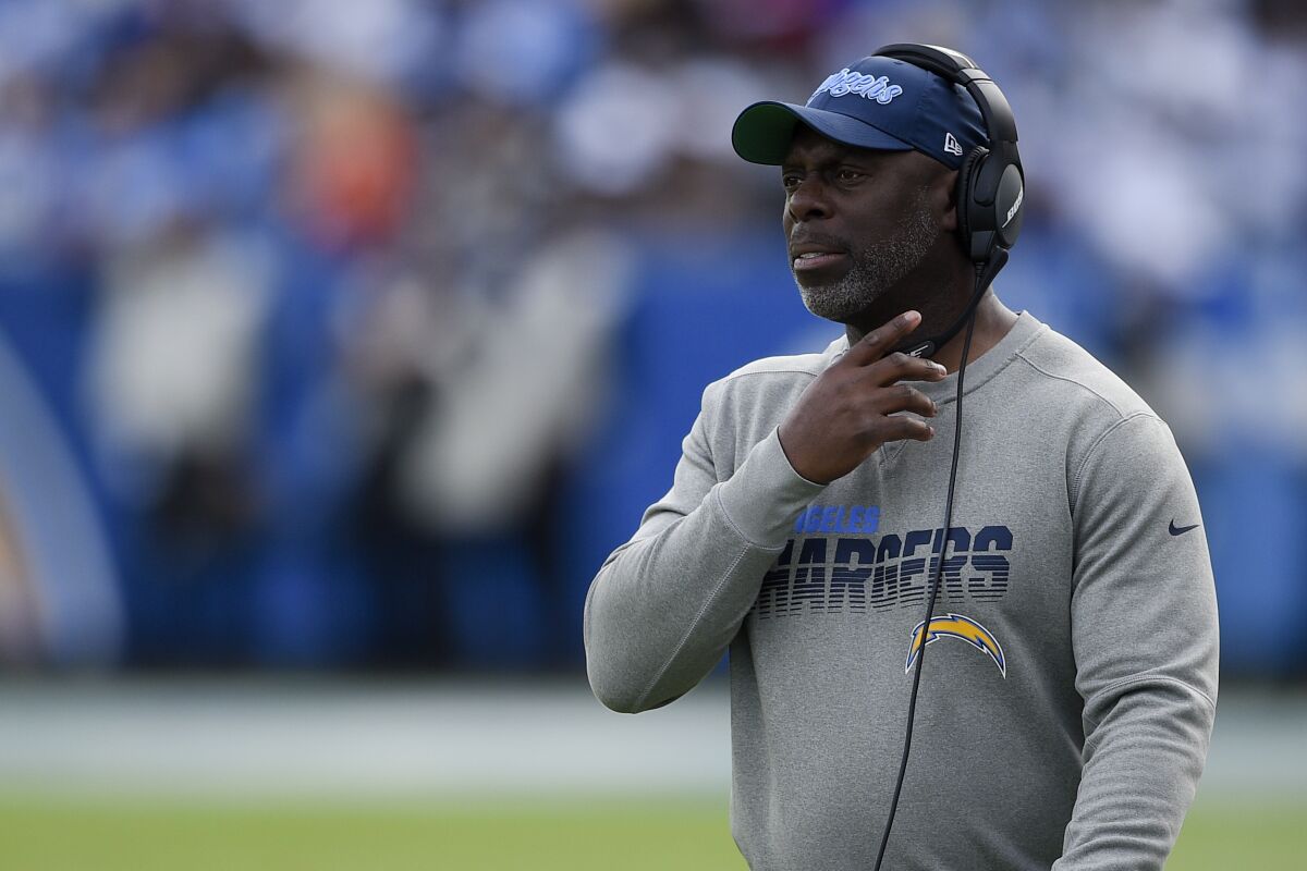 Anthony Lynn watches the Chargers play during a game in December.
