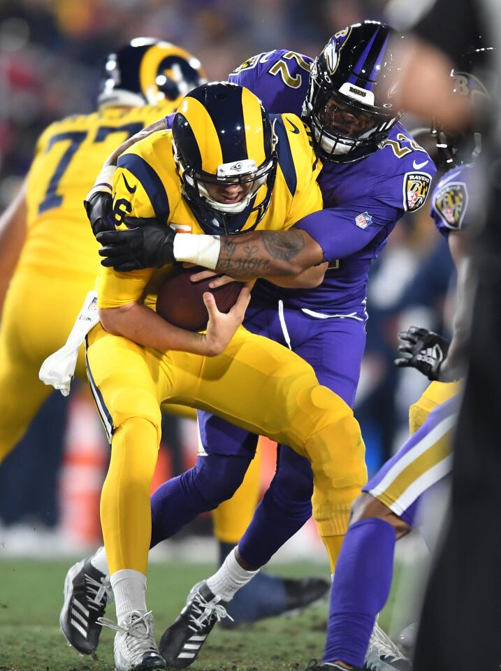 Rams quarterback Jared goff is sacked by Ravens cornerback Jimmy Smith during the first quarter of a game Nov. 25 at the Coliseum.