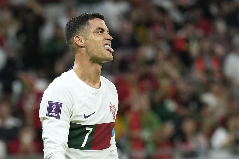 Portugal's Cristiano Ronaldo reacts during the World Cup group H soccer match between South Korea and Portugal, at the Education City Stadium in Al Rayyan , Qatar, Friday, Dec. 2, 2022. (AP Photo/Francisco Seco)