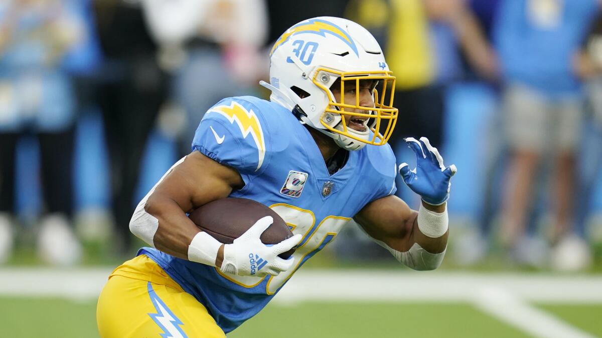 Chargers running back Austin Ekeler takes off on a run.