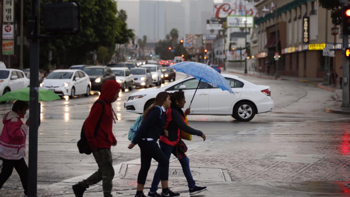 Rain-slicked roads became a challenge Monday morning Oct. 24 at Vermont and Olympic near downtown as scattered showers lingered from a wet storm system that moved in over the weekend.