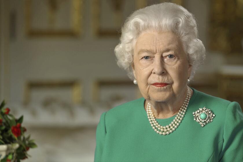 Image of Britain's Queen Elizabeth II addressing the nation and the Commonwealth from Windsor Castle.