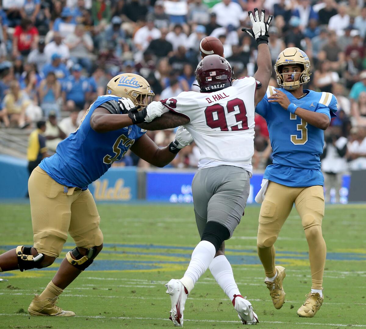 UCLA quarterback Dante Moore throws in the second quarter against North Carolina Central.