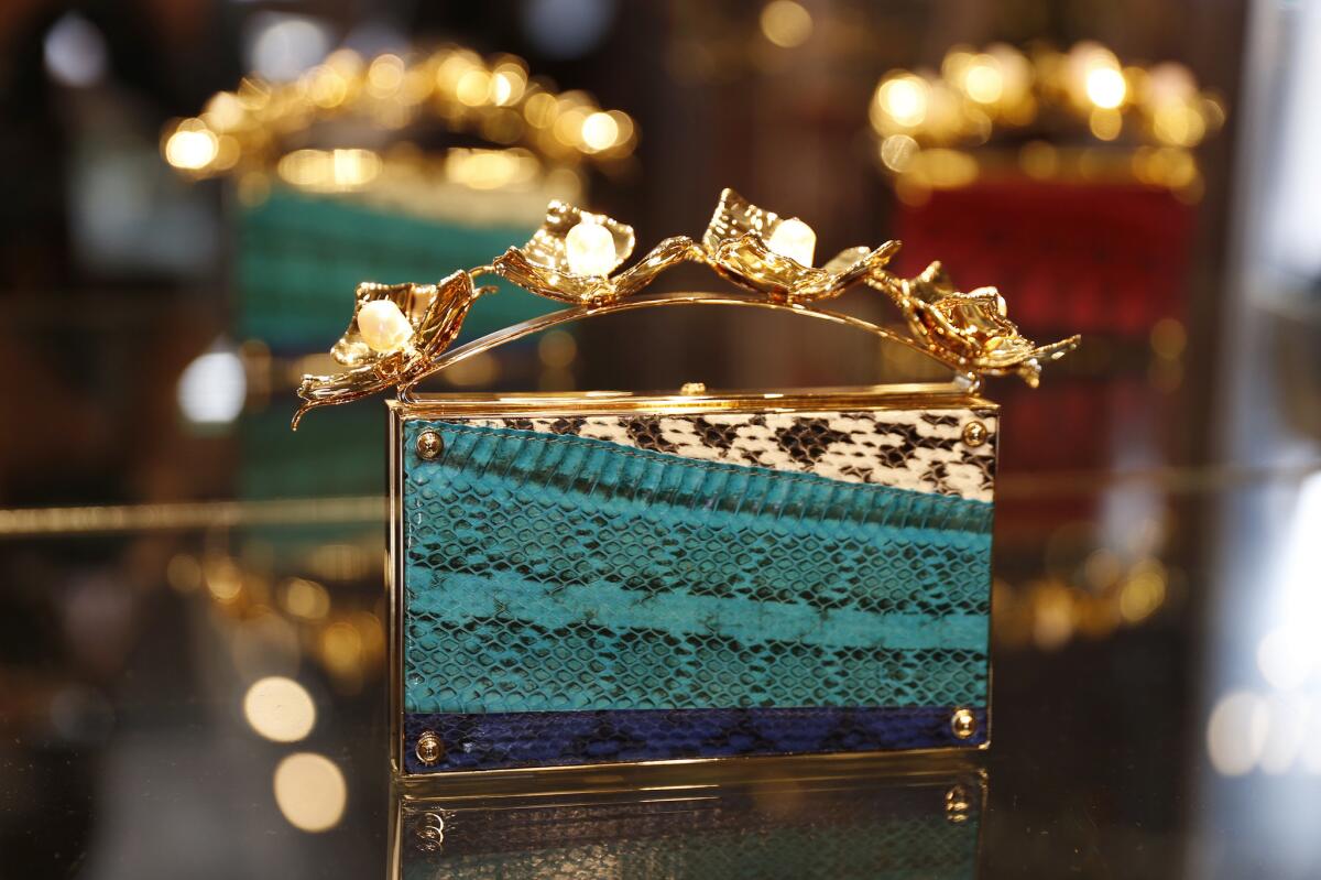 The "Golden Orchid" evening clutch at Thalé Blanc.