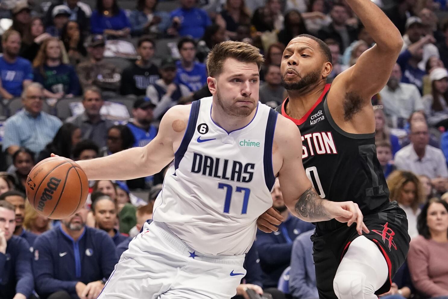 Dallas Mavericks guard Luka Doncic (77) reacts during the second quarter  against the New York Knicks at American Airlines Center.