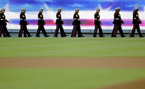 Marines enter the field at Dodger Stadium for a 9/11 ceremony honoring Heroes before the Dodger game.