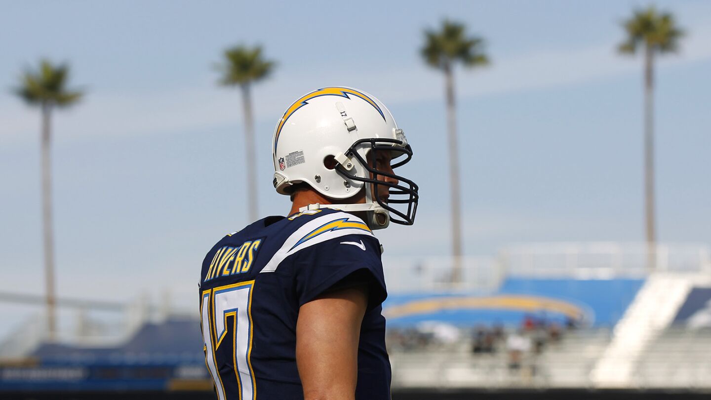 Los Angeles Chargers quarterback Philip Rivers warms up against the Oakland Raiders at the Stubhub Center in Carson on Dec. 31, 2017.