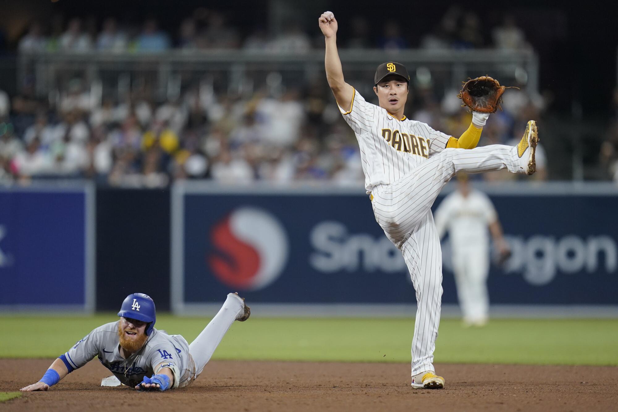 The Padres beat the Dodgers on a walk-off walk Tuesday night. (AP Photo/Gregory Bull)