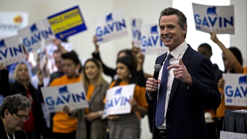 Then-gubernatorial candidate Gavin Newsom attracted crowds at the California Democratic Party's 2018 convention in San Diego, but now, as governor, he must deal with a party in disarray after a sexual harassment scandal led to the resignation of its chairman.
