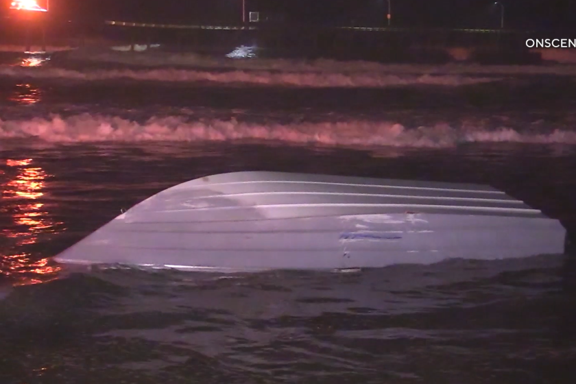 This screenshot from OnScene TV shows the panga boat that capsized and washed up near Ocean Beach Pier early Sunday morning