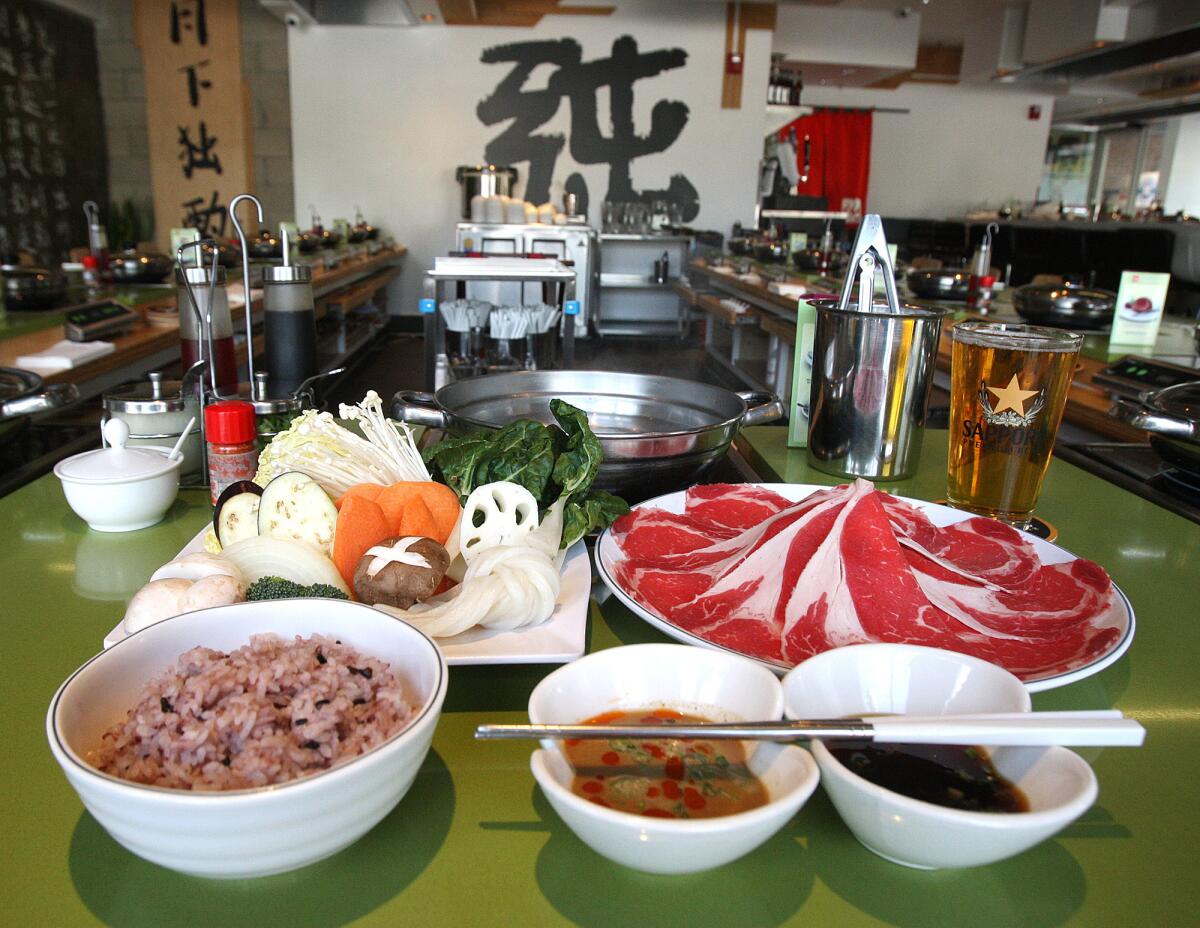 Angus beef, of freshly sliced Angus rib-eye, with a fresh assortment of vegetables, black rice, udon noodles and tofu at Joon Shabu Shabu in Glendale on Thursday, October 10, 2013.