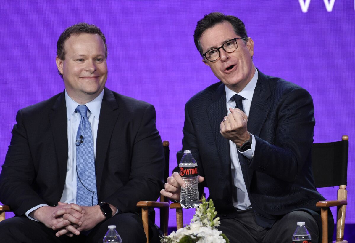 Stephen Colbert and executive producer Chris Licht, left, at the Television Critics Association Press Tour in January 2018.