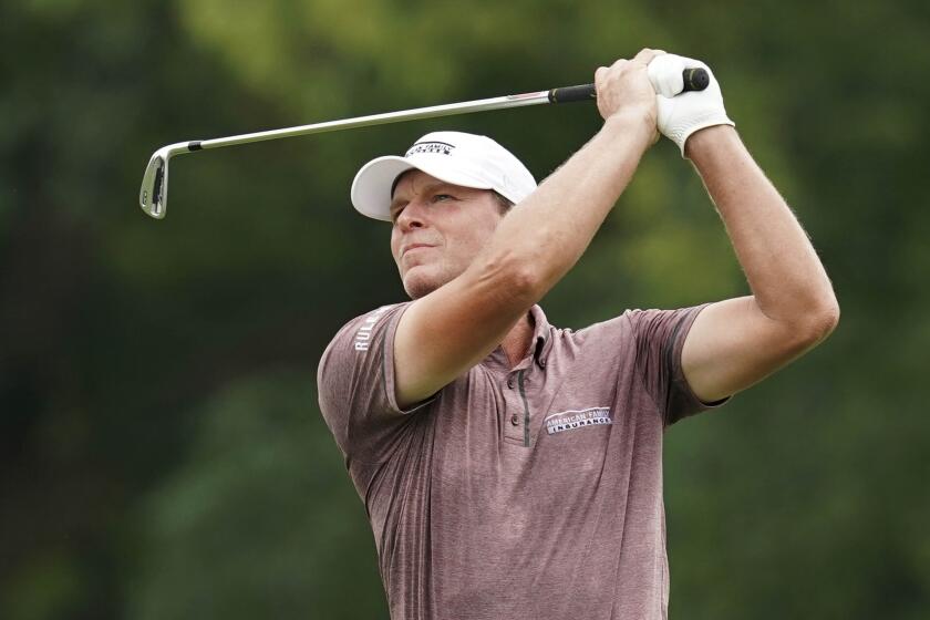 FILE - In this Sunday, July 15, 2018, file photo, Steve Stricker hits on the ninth fairway during the final round of the John Deere Classic golf tournament at TPC Deere Run in Silvis, Ill. Stricker now gets six captain's picks for his U.S. Ryder Cup team, and qualifying has been extended by one week. The changes announced Wednesday, June 10, 2020, account for golf not being played for three months during the coronavirus pandemic. (AP Photo/Charlie Neibergall, File)