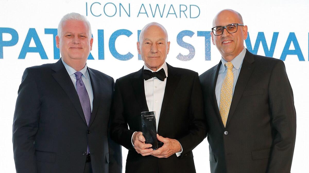 Gary Sherwin, left, and Gregg Schwenk, right, present actor Patrick Stewart with the Icon Award at the Newport Beach Film Festival UK Honours in association with Visit Newport Beach at The Rosewood Hotel in London earlier this month.