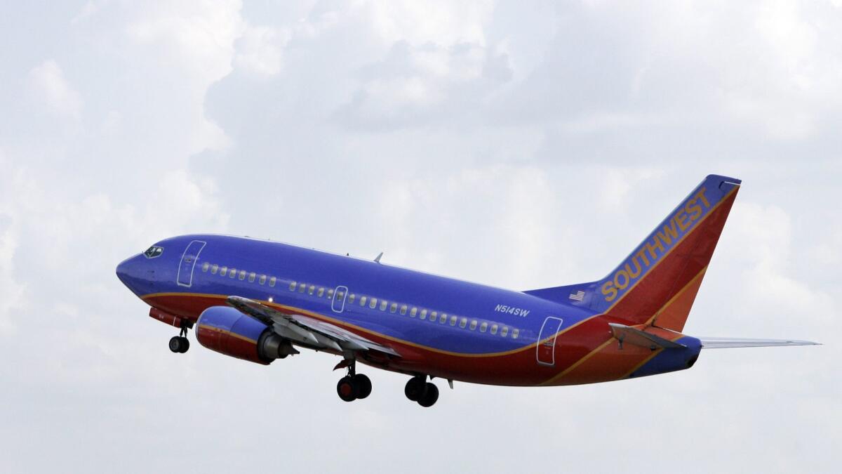 A Southwest Airline jet takes off from Dallas' Love Field in 2007. This week, a Southwest flight on the way to Love Field from Seattle had to turn back after a human heart was left on board.