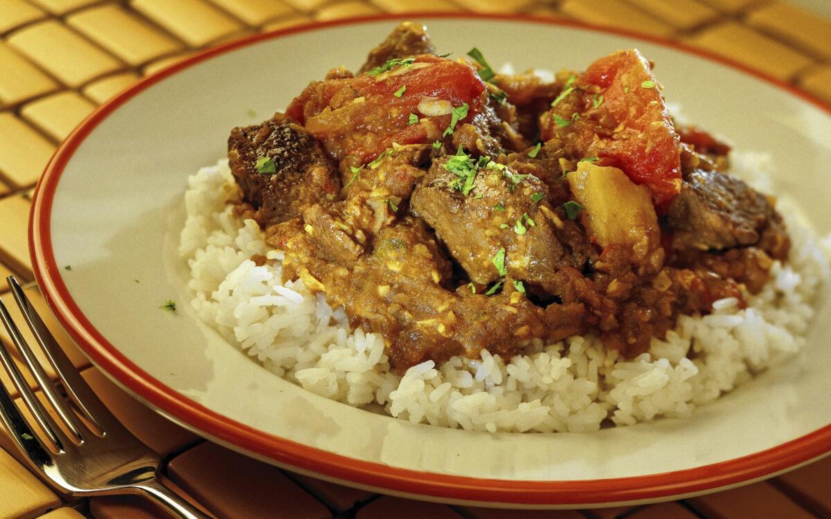 Clay Oven's spicy habanero lamb vindaloo, served on a bed of rice