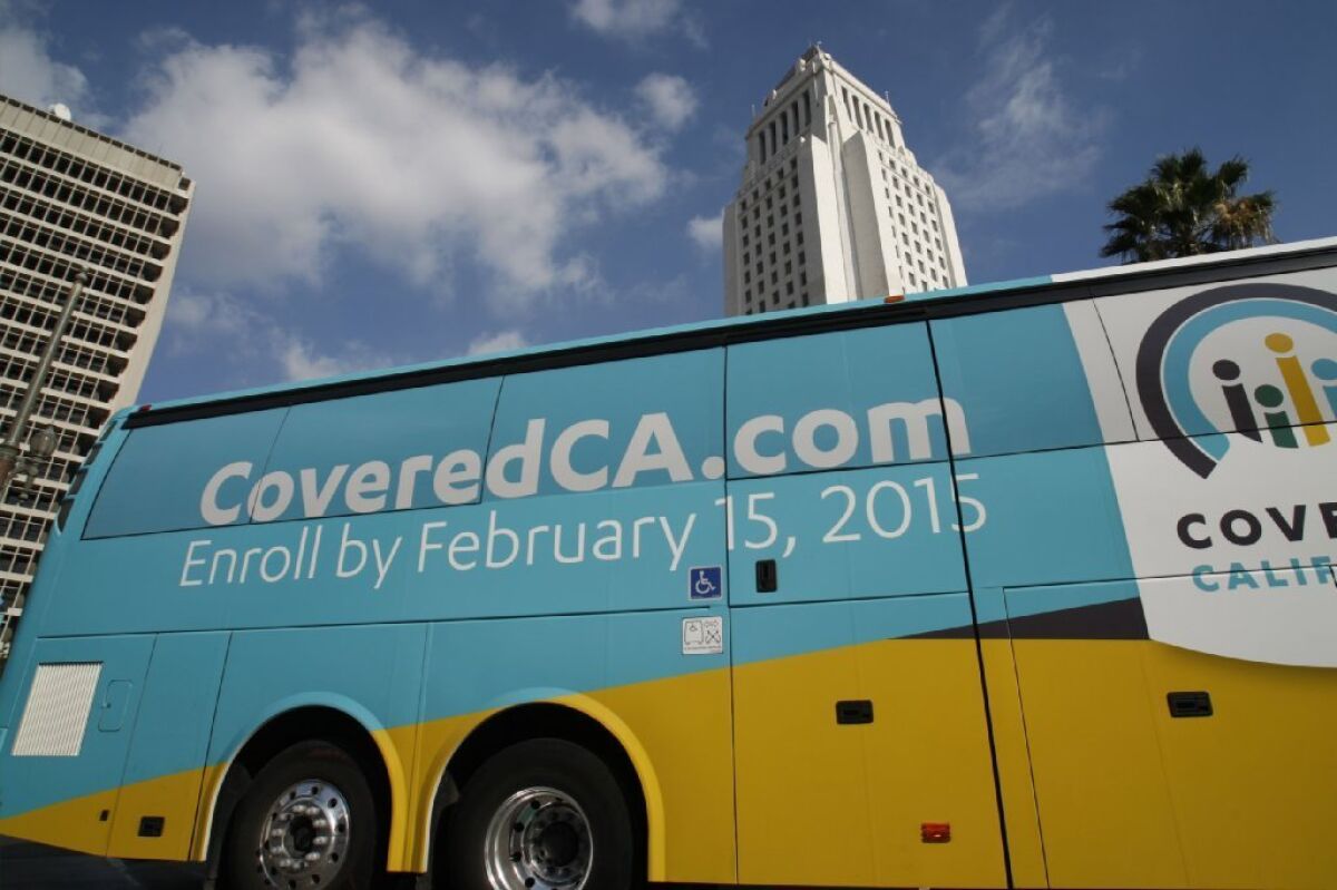 In a new poll, 39% of Californians said the state insurance exchange isn't working well, or not at all. Above, a Covered California bus came to downtown Los Angeles Nov. 14.