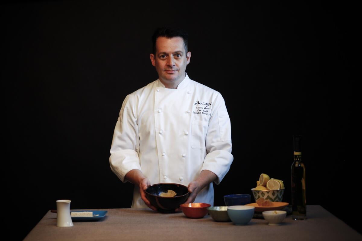 Pastry chef Lee Smith of the Montage Laguna Beach plates a chilled almond soup with torrone and citrus.