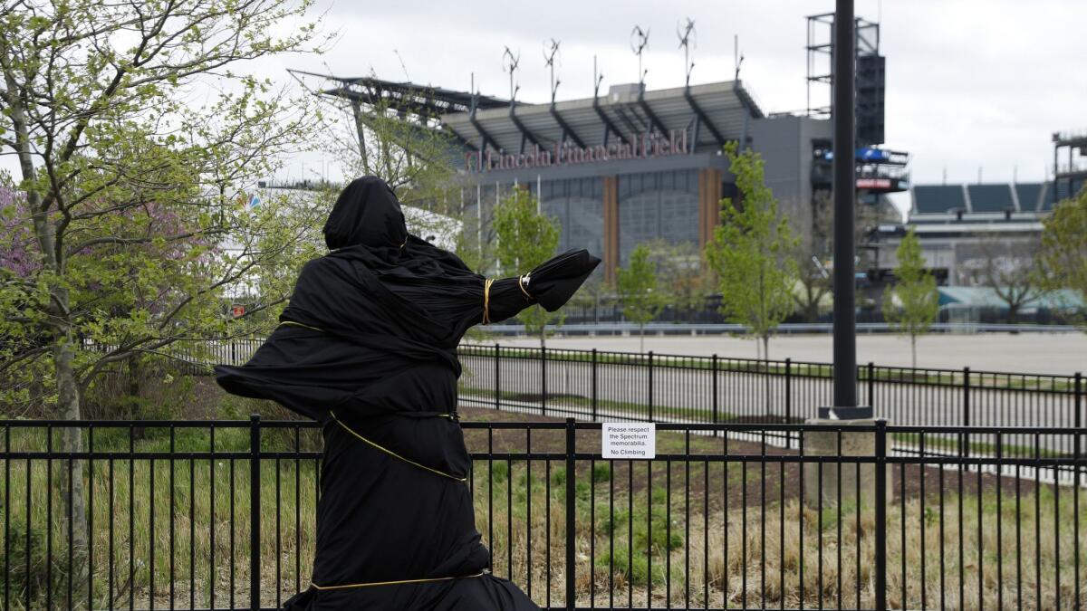 The statue of Kate Smith near the Wells Fargo Center in Philadelphia has been covered.