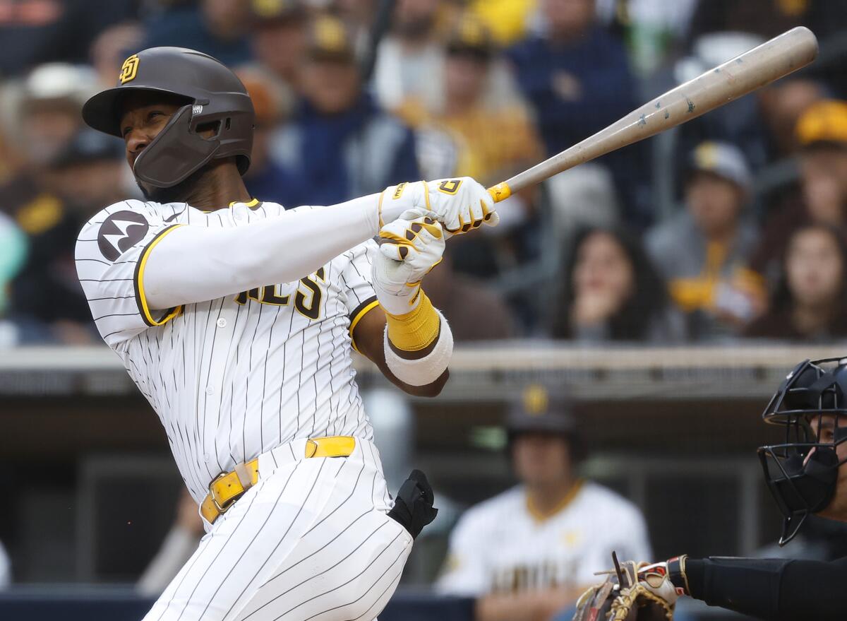 Jurickson Profar hits a two-run home run against the Miami Marlins at Petco Park.
