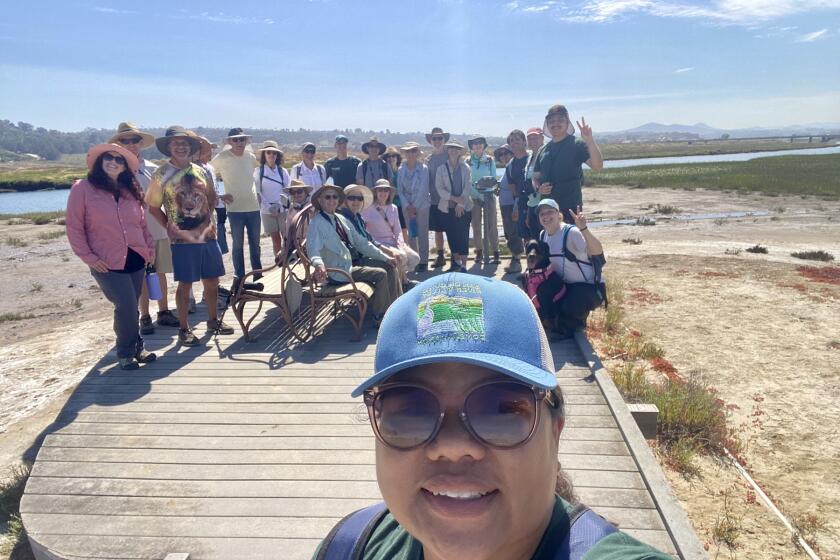 Cheryl Goddard, San Dieguito River Valley Conservancy’s executive director, taking a selfie with “Walk ’n Talk” participants.