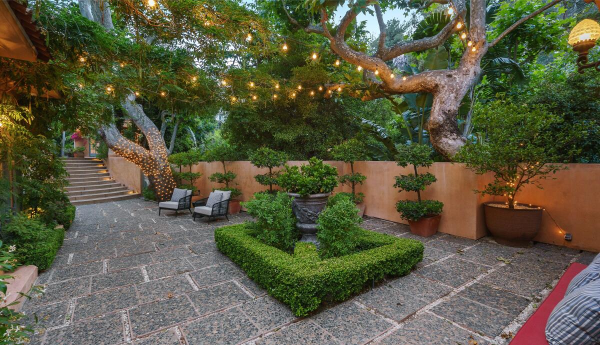 Kunal Nayyar's half-acre estate includes a single-story villa and two guesthouses surrounded by patios and courtyards.