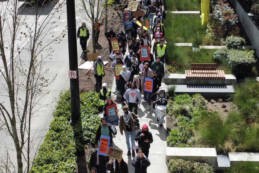 A rally outside of a Google Seattle office on April 16, protesting the tech giant's cloud computing contract with Israel.