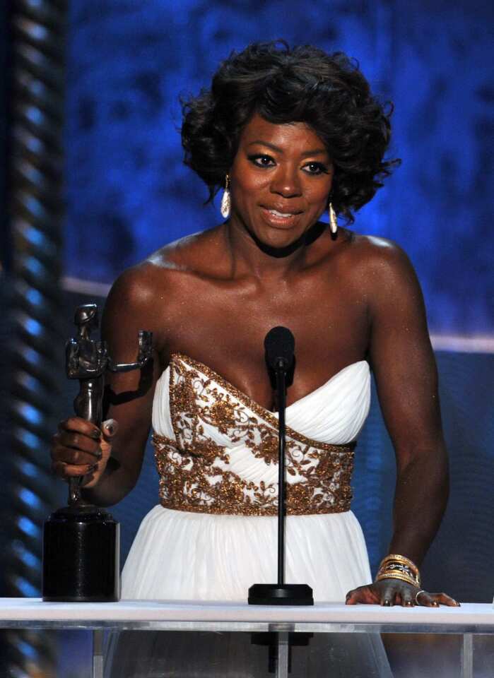 Viola Davis accepts the award for outstanding performance by a female actor in a leading role for the film "The Help."