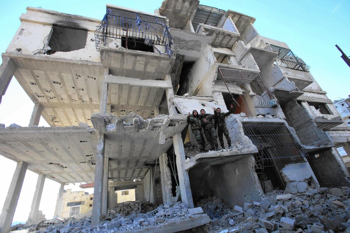 Pro-government fighters in the strategic Syrian town of Salma in Latakia province on Jan. 15.