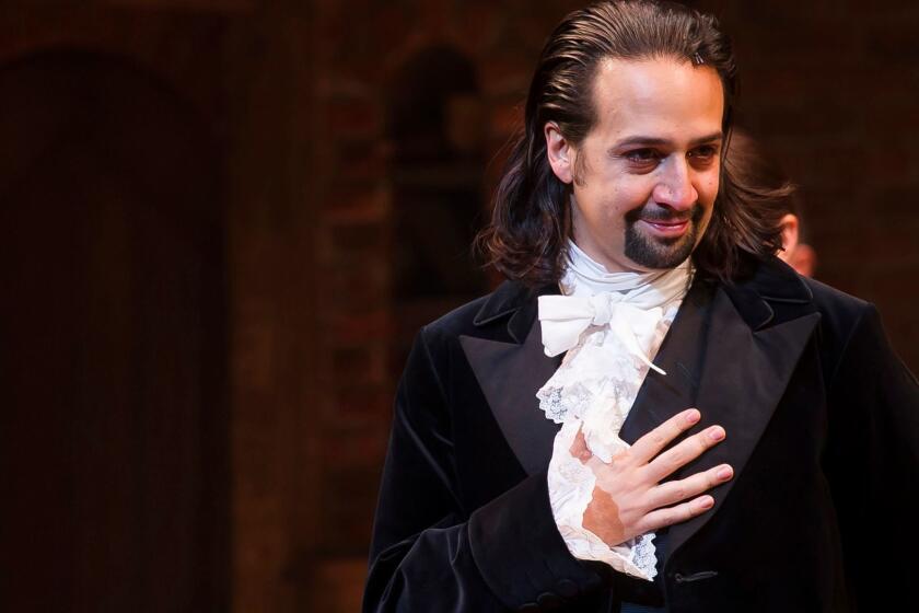 FILE - In this Aug. 6, 2015, file photo, Lin-Manuel Miranda appears at the curtain call following the opening night performance of "Hamilton" at the Richard Rodgers Theatre in New York. Miranda has enlisted celebrities to sing lyrics from the musical and post them to social media in order to raise money for a coalition of non-profits focused on immigration. (Photo by Charles Sykes/Invision/AP, File)