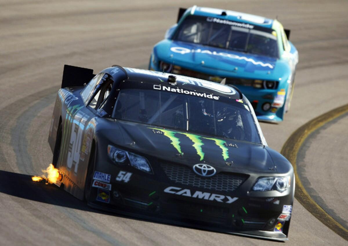 Kyle Busch leads the Nationwide Series Servicemaster 200 on Saturday en route to victory.