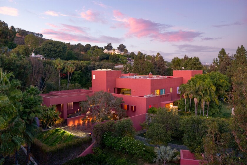 Film producer Joel Silver’s Ricardo Legorreta-designed home in Brentwood has a massive atrium, hydraulic doors and a screening room.