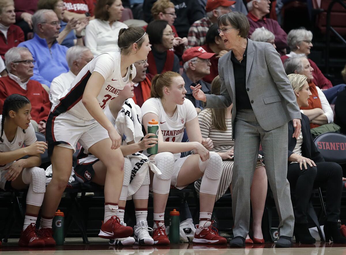 Stanford coach Tara VanDerveer, right, calls guard Hannah Jump (33) into the game during the first half against Tennessee on Dec. 18, 2019 in Stanford.