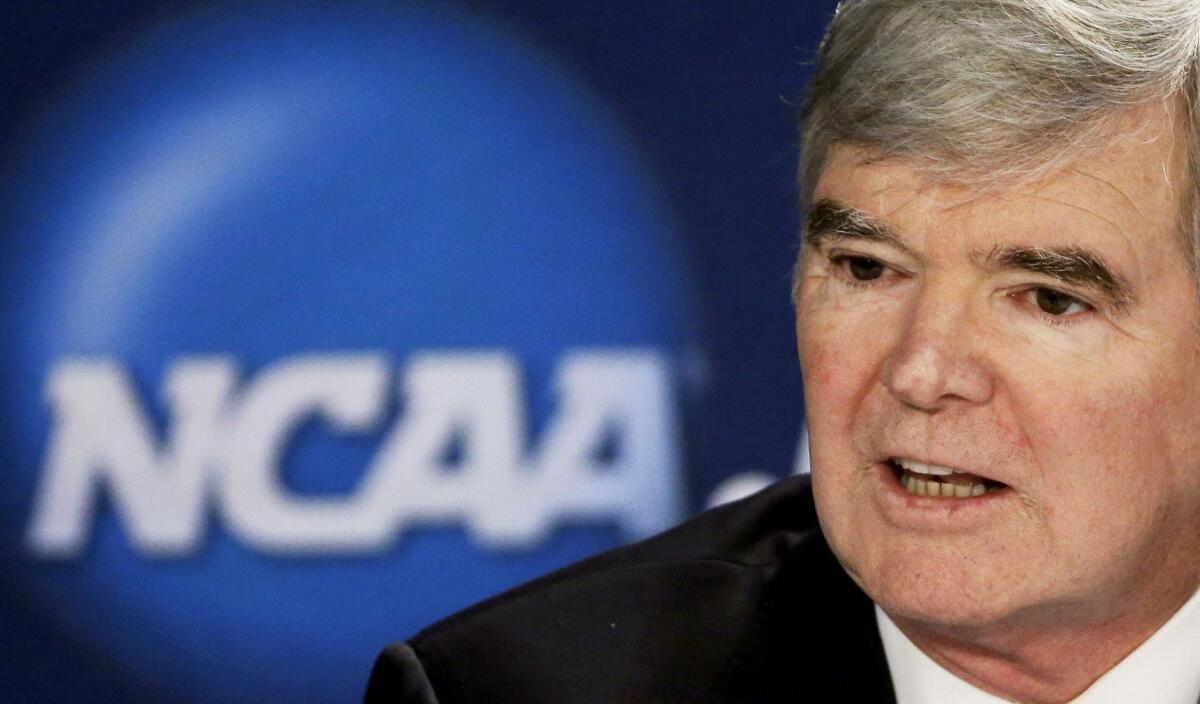 NCAA President Mark Emmert answers a question at a news conference in Arlington, Texas on April 6.